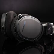 Black gaming headphones in black background