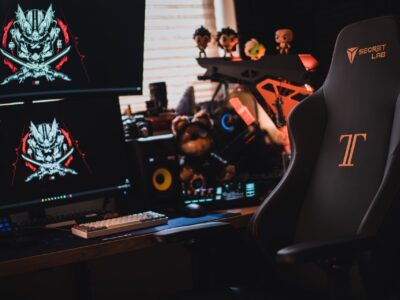 gaming chair placed infront of gaming setup