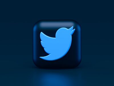 twitter logo in blue and black background